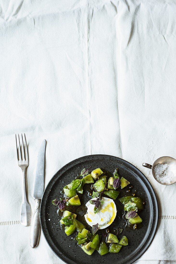 Green tomato and kiwi salad with buffalo mozzarella