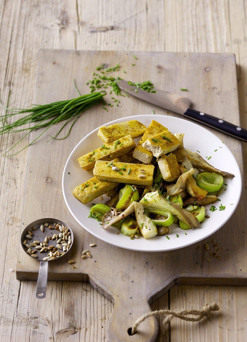 Fried tofu with an oyster mushroom medley