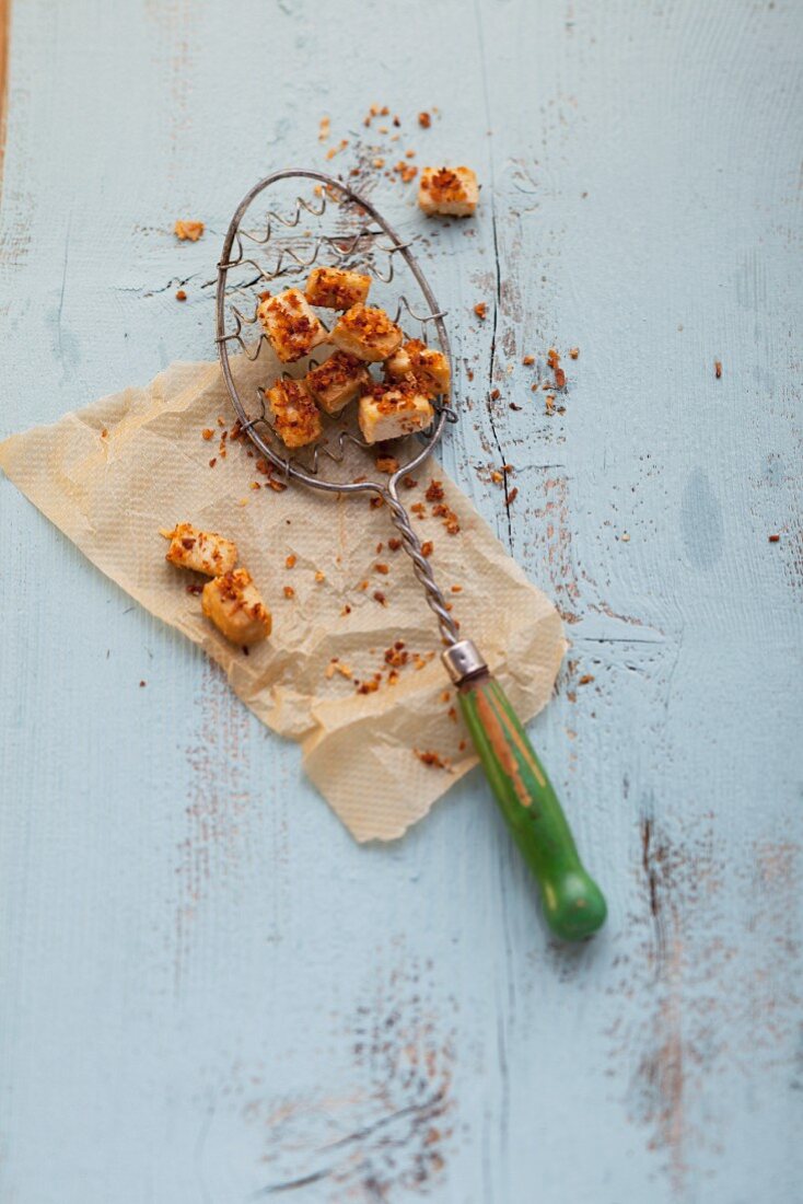 Diced tofu with a light coconut coating for soup