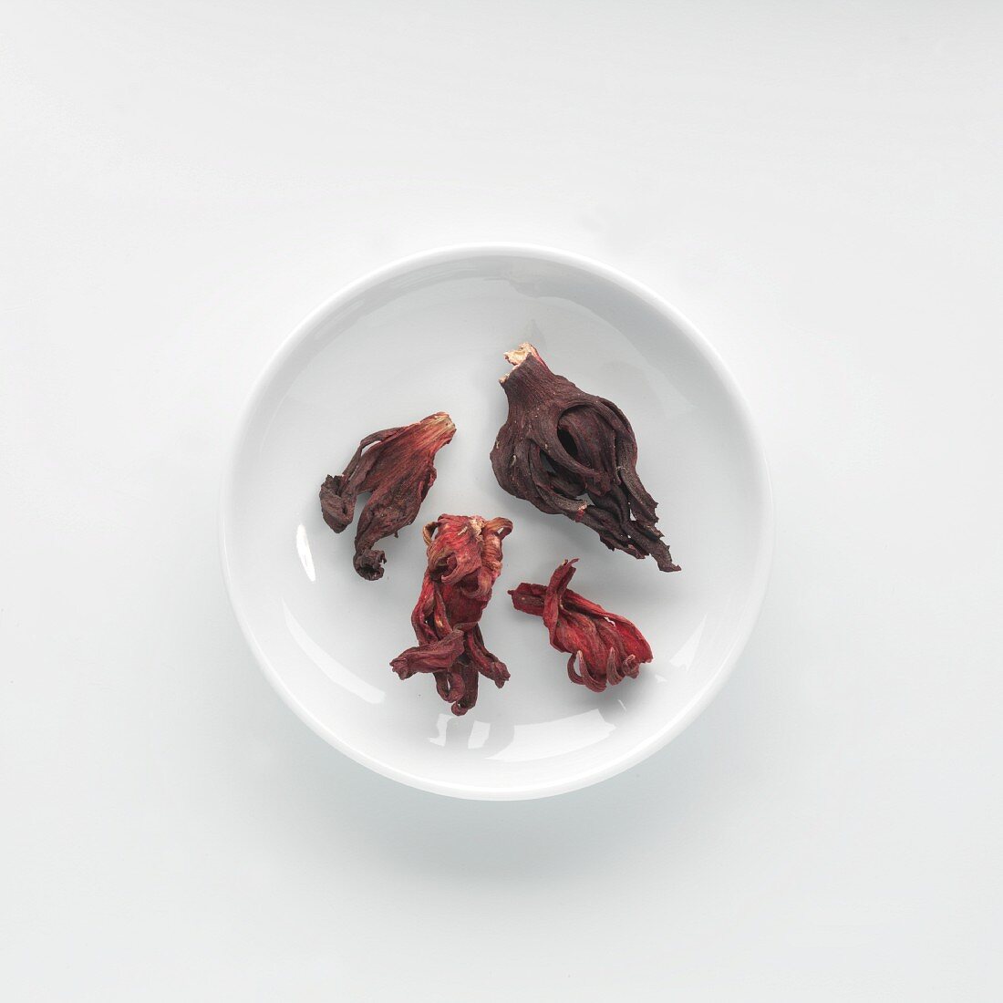 Dried hibiscus flowers and mallows on a plate