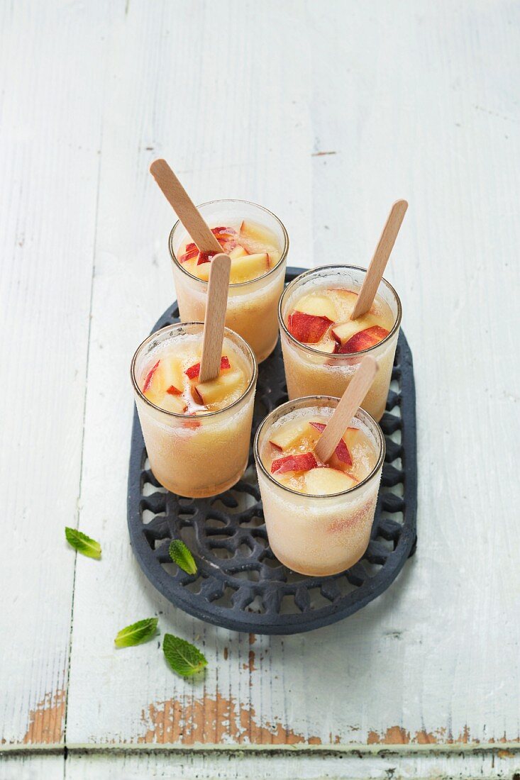 Homemade apple ice cream with mint in glasses
