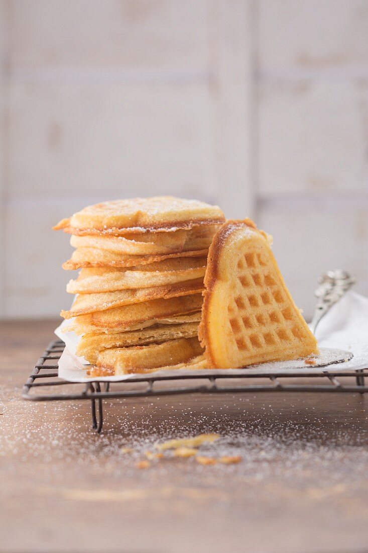 A stack of heart-shaped cinnamon waffles