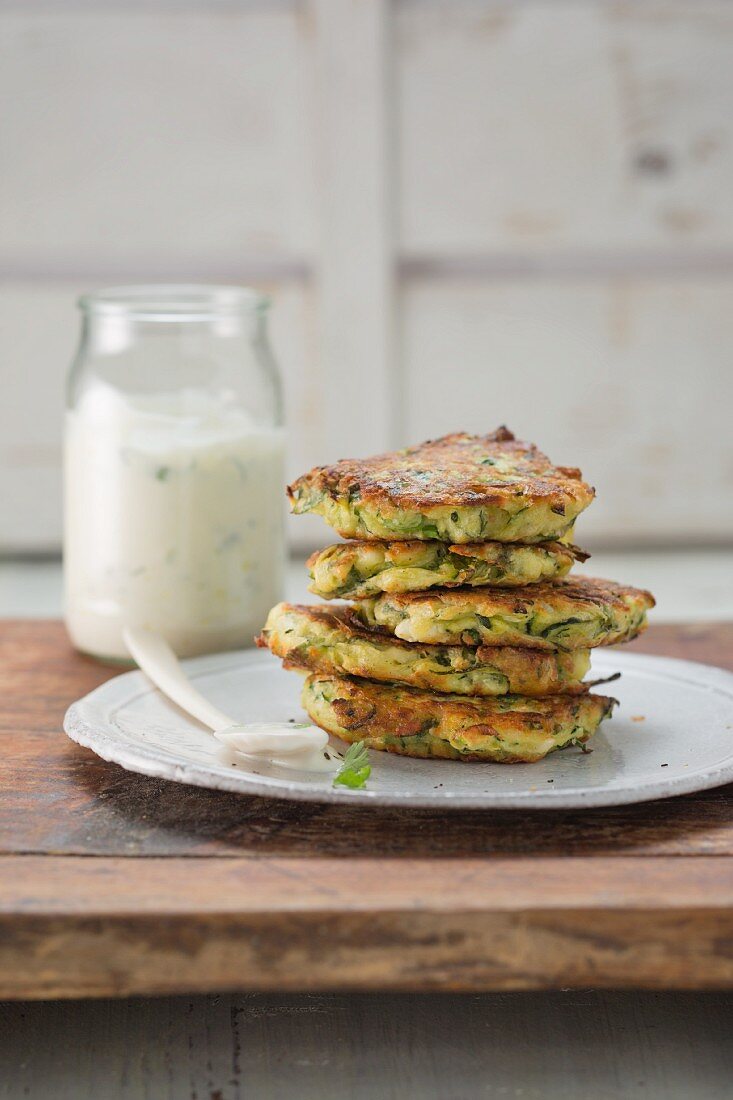 Courgette cakes with a yoghurt sauce