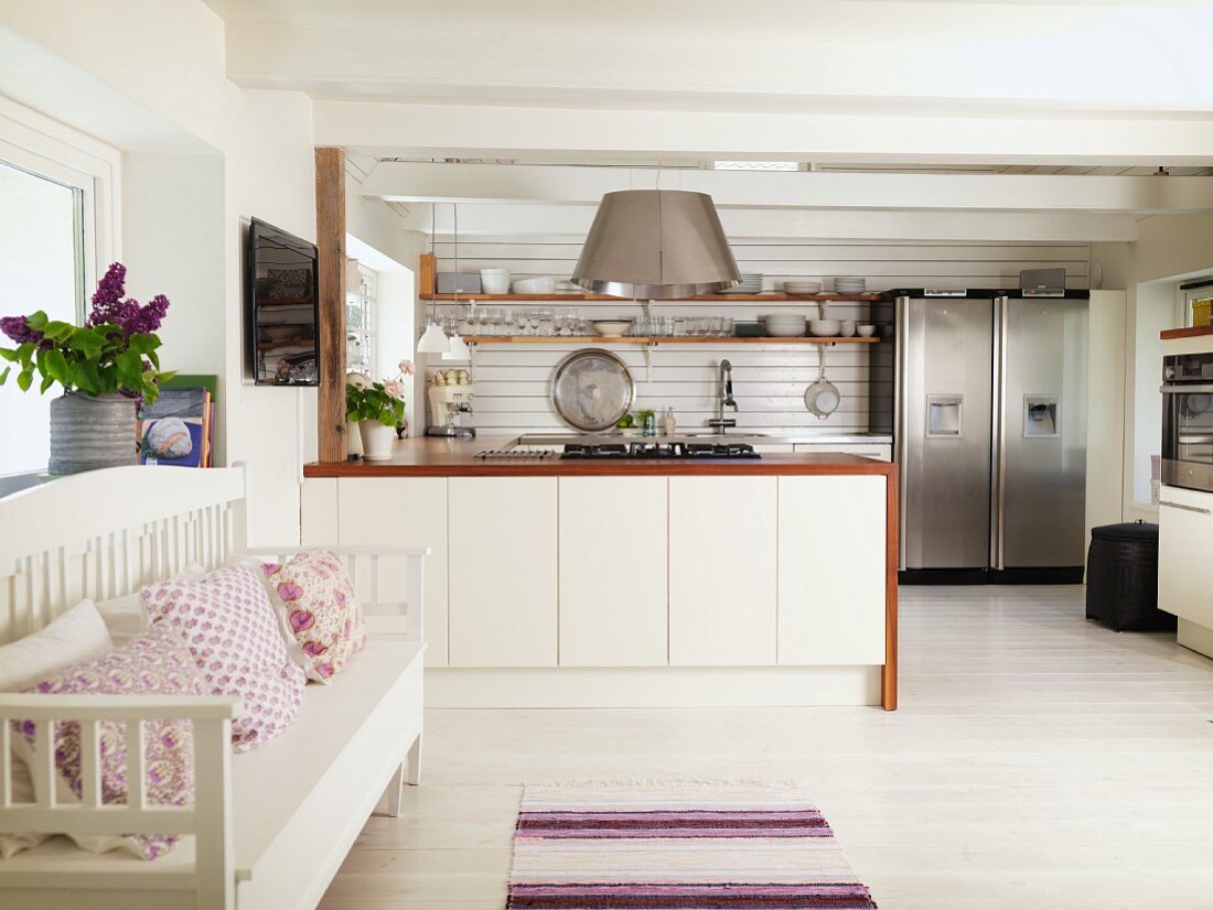 Modern, fitted kitchen in renovated country house with vintage ambiance
