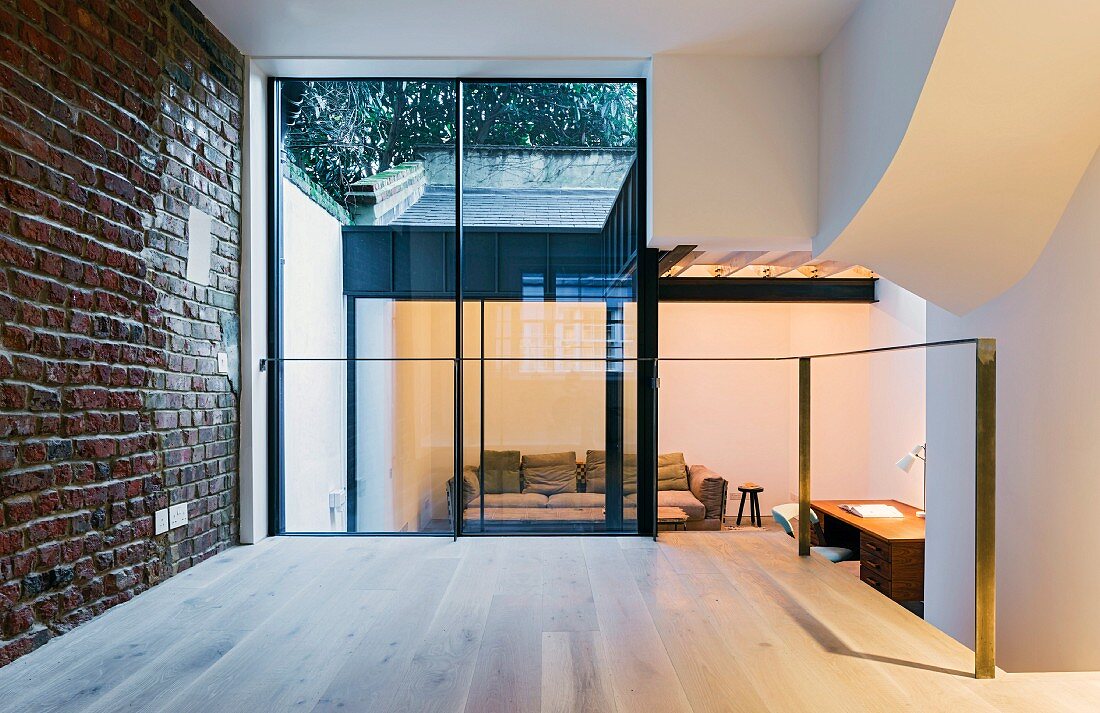 View from wooden platform into sunken living room