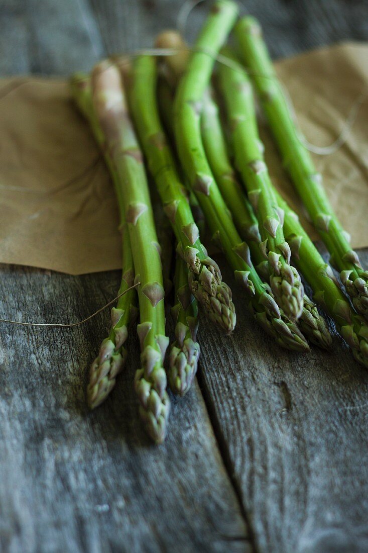 Fresh asparagus on a wooden board
