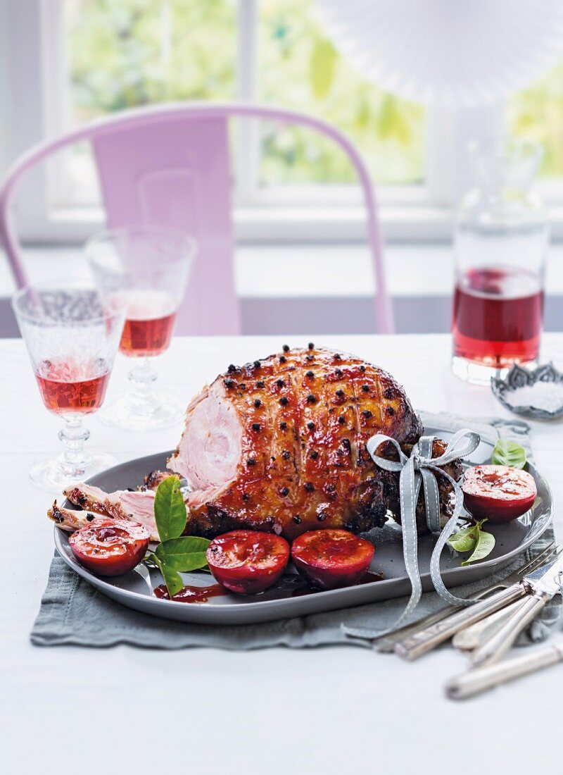 Roast ham with plum glaze for Christmas dinner