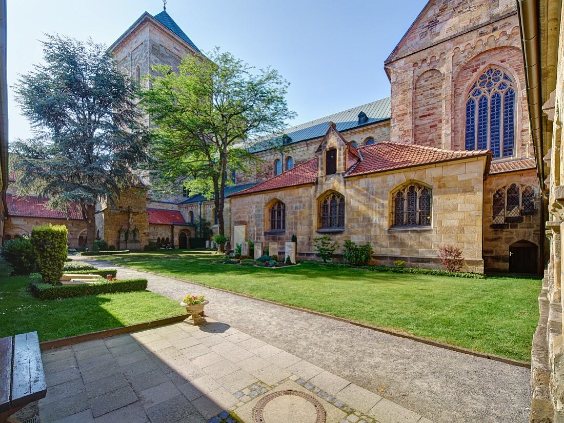 The sunlit courtyard of Osnabrück cathedral