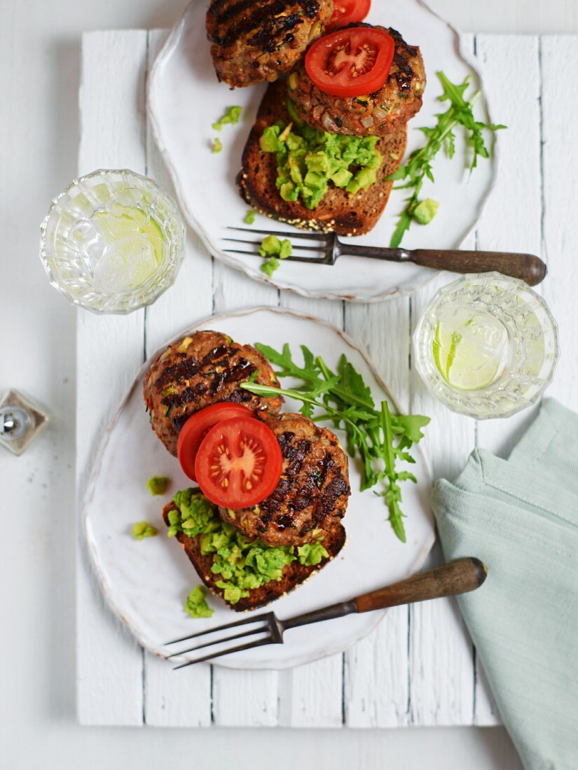 Healthy veggie burgers with avocado and tomato