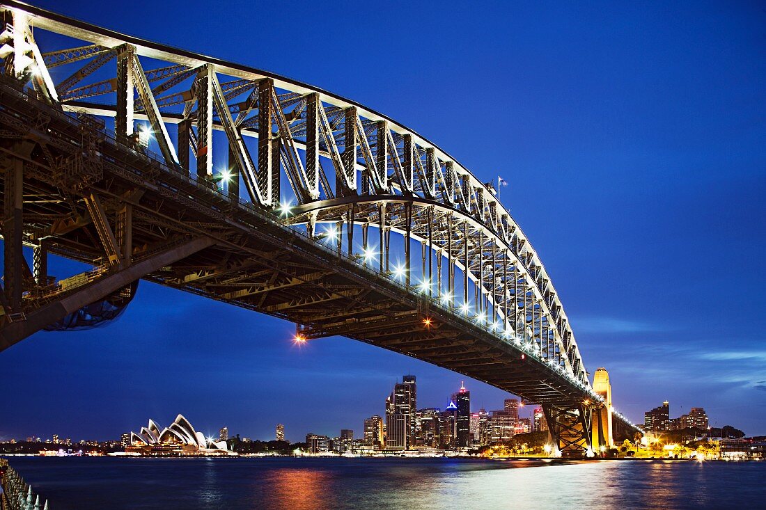 The illuminated harbour bridge by night, Sydney