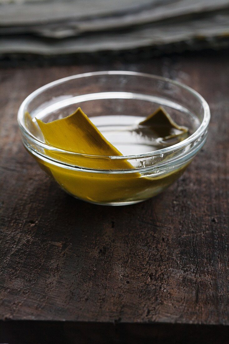 Wakame seaweed being soaked in water for four hours