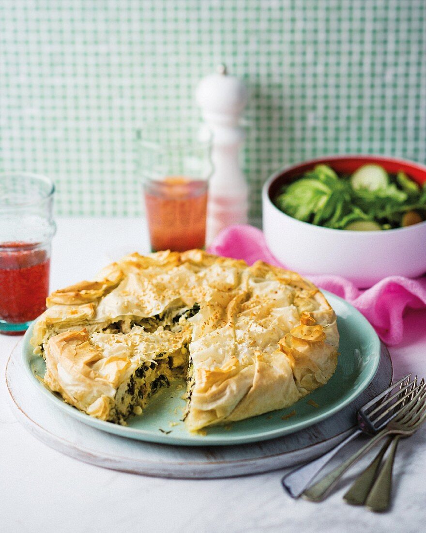 Puff pastry pie with spinach, chicken, feta cheese and eggs (Greece)