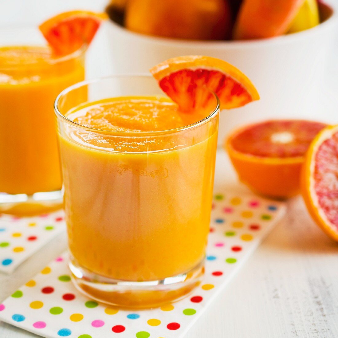 Smoothies made with orange fruits and vegetables