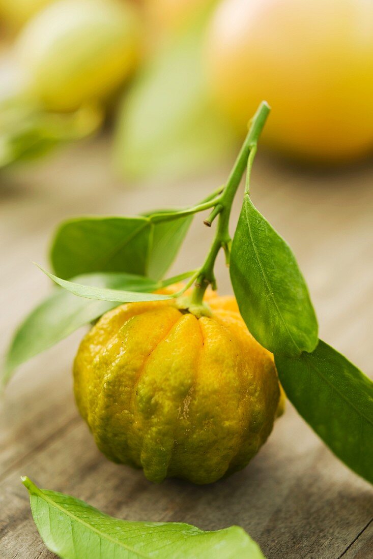 A lemon on a wooden surface