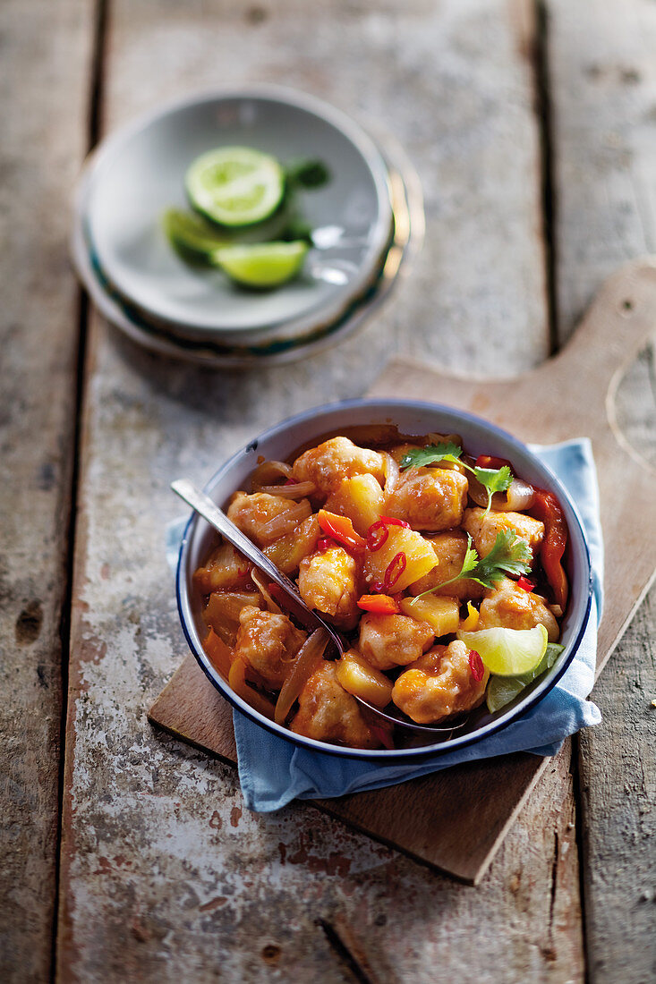 Sweet and sour chicken with pineapple, chillis and oranges