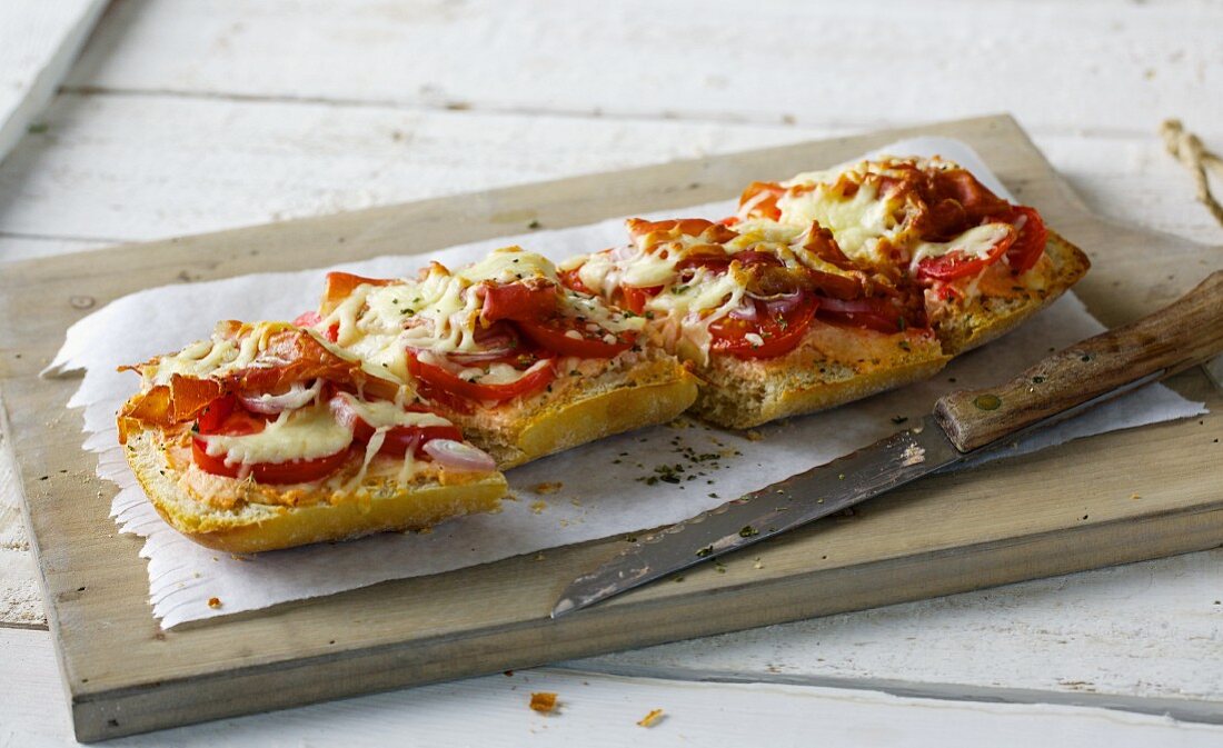 Gratinated ciabatta toast with tomatoes and Parma ham