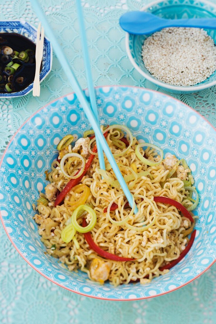 An oriental noodle dish with vegetables, chicken and soy sauce