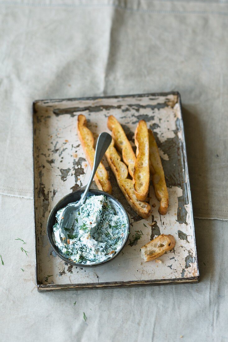 Grilled bread with a feta cheese and spinach spread