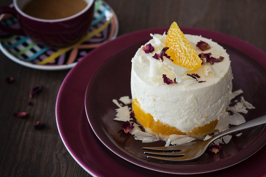 A mini cheesecake with oranges and white chocolate