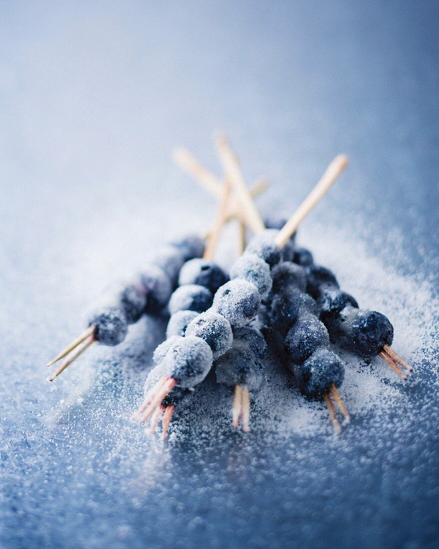 Frozen blueberries on skewers