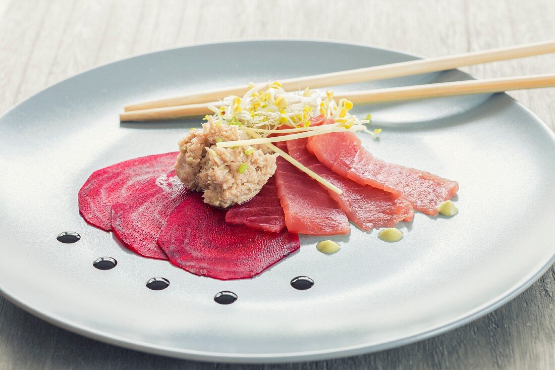 Beetroot carpaccio with a tuna and lemongrass cream, sashimi, wasabi and soy sauce