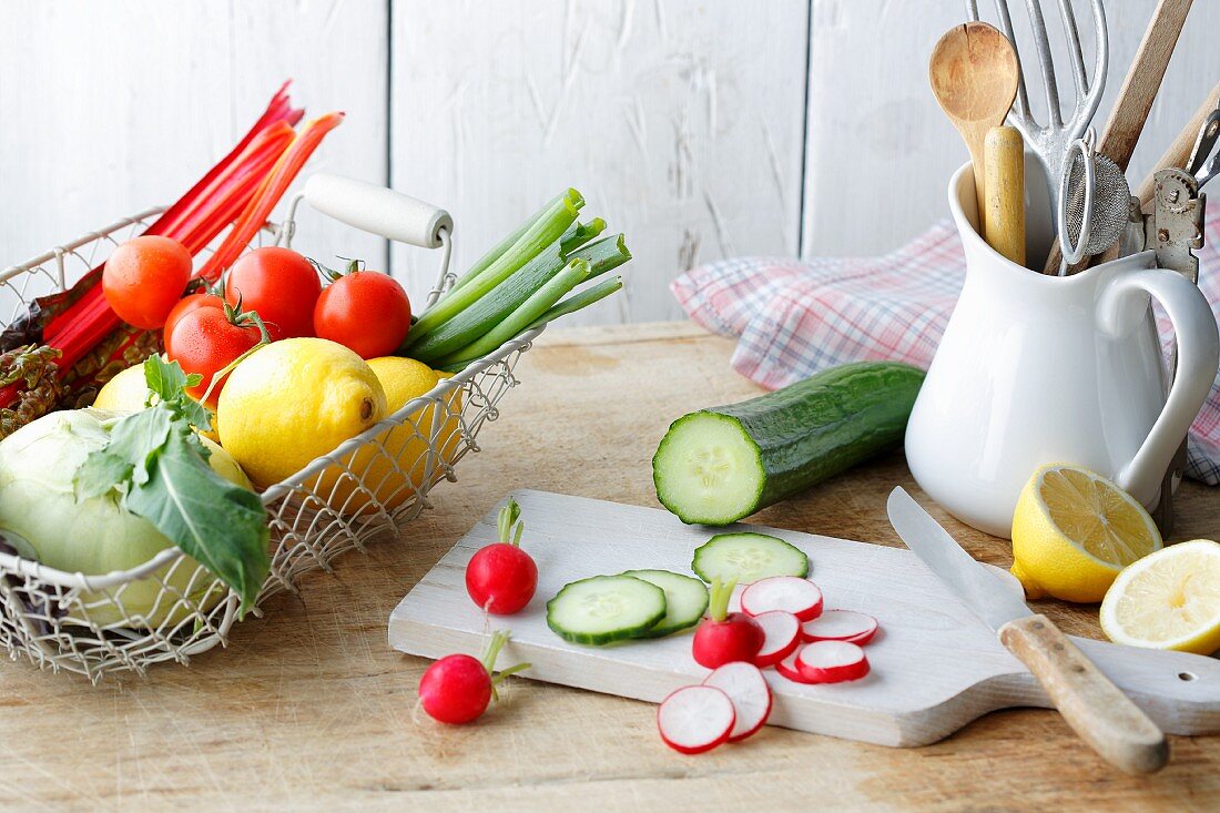 An arrangement of vegetables and lemons