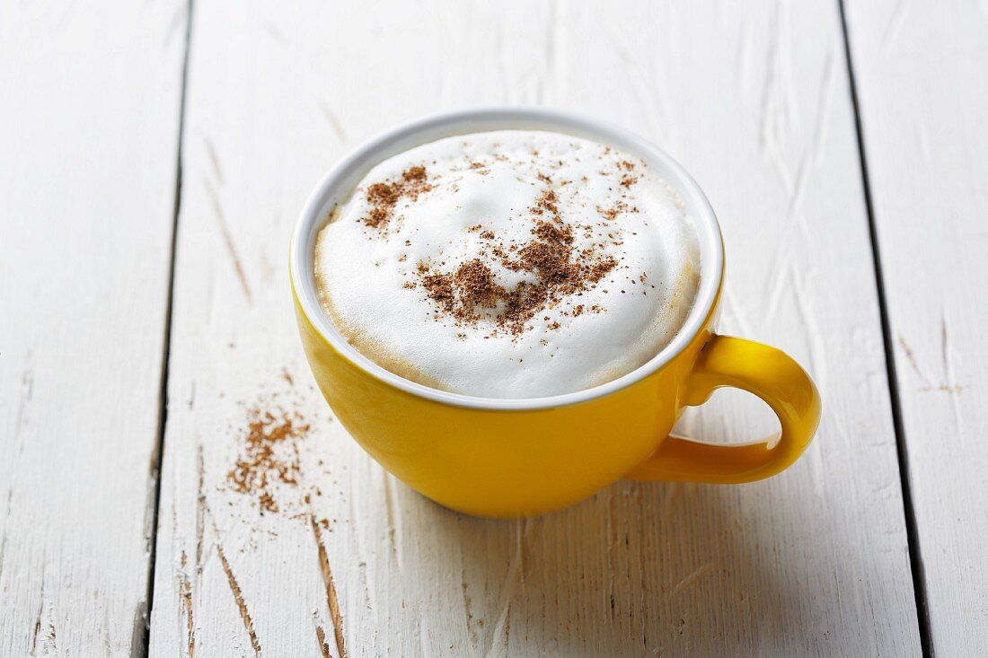 A cappuccino with good mood spices
