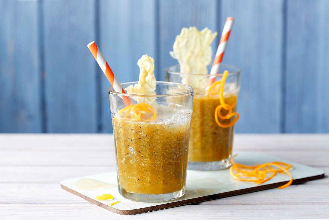 Vegan papaya smoothies with chia seeds and savoy cabbage leaves