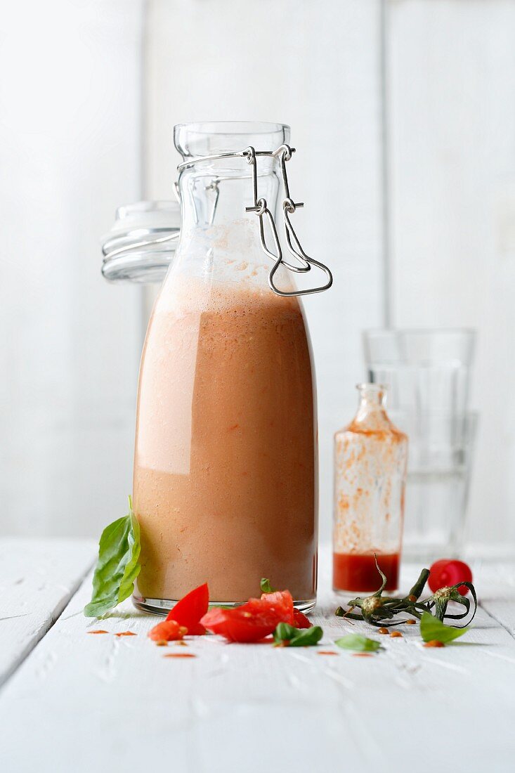 A tomato and basil smoothie made with buttermilk
