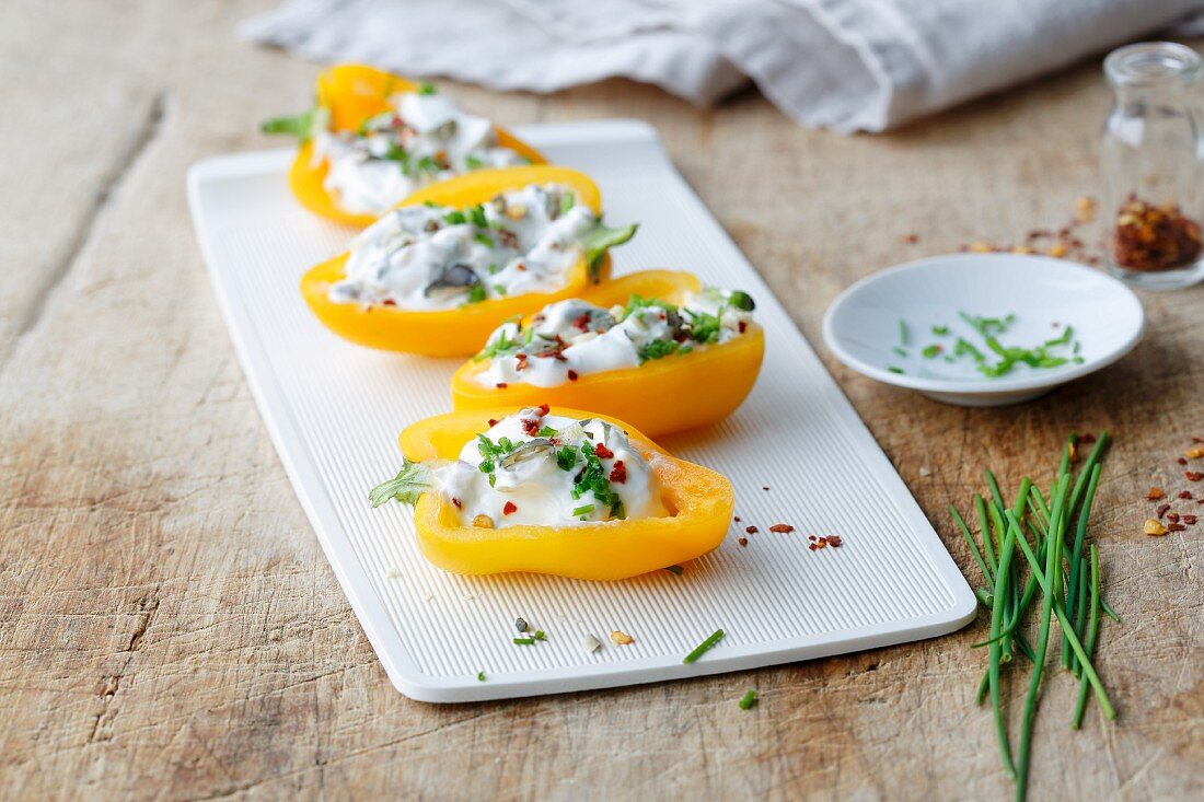Yellow peppers filled with a spicy quark filling