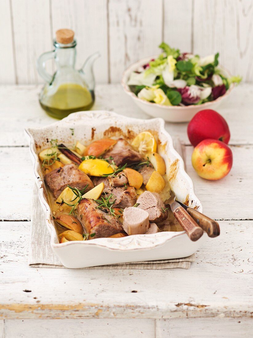 Baked pork fillet with apples, honey and lemons