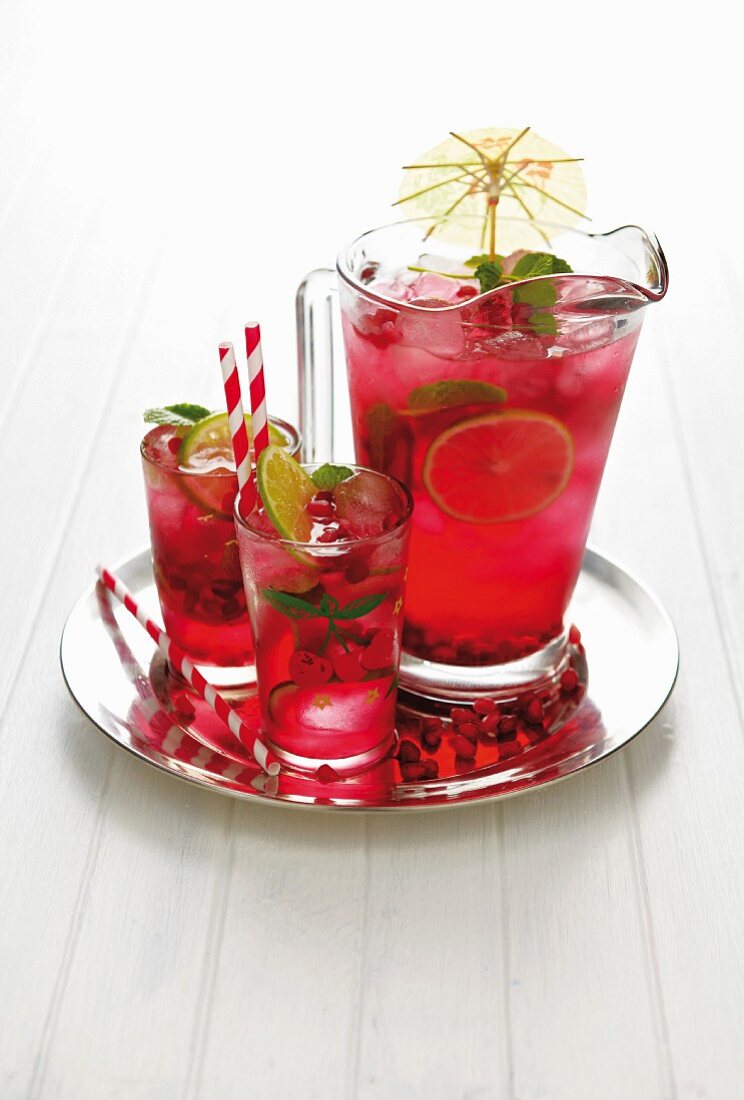 Pomegranate coolers with limes