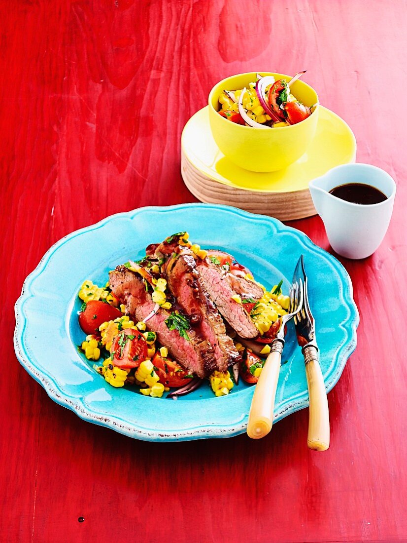 Marinated beef steak with corn salad