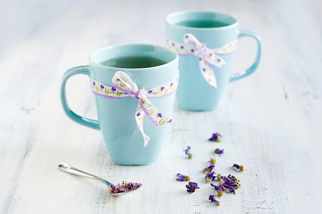 Mallow Tea In Two Light Blue Cups License Images Stockfood
