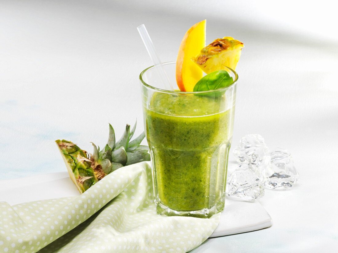 A spinach smoothie with exotic fruits