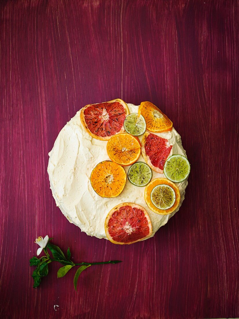 A citrus fruit cake with cream cheese frosting