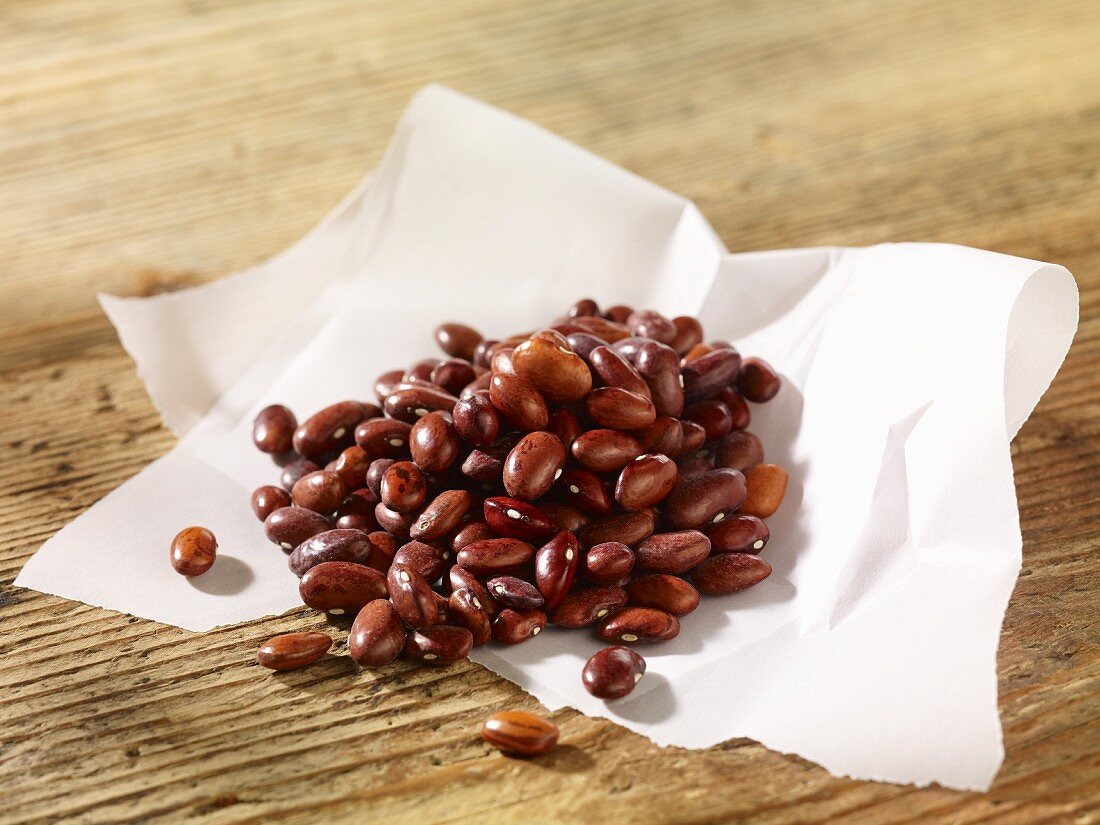 Borlotti beans on a piece of paper