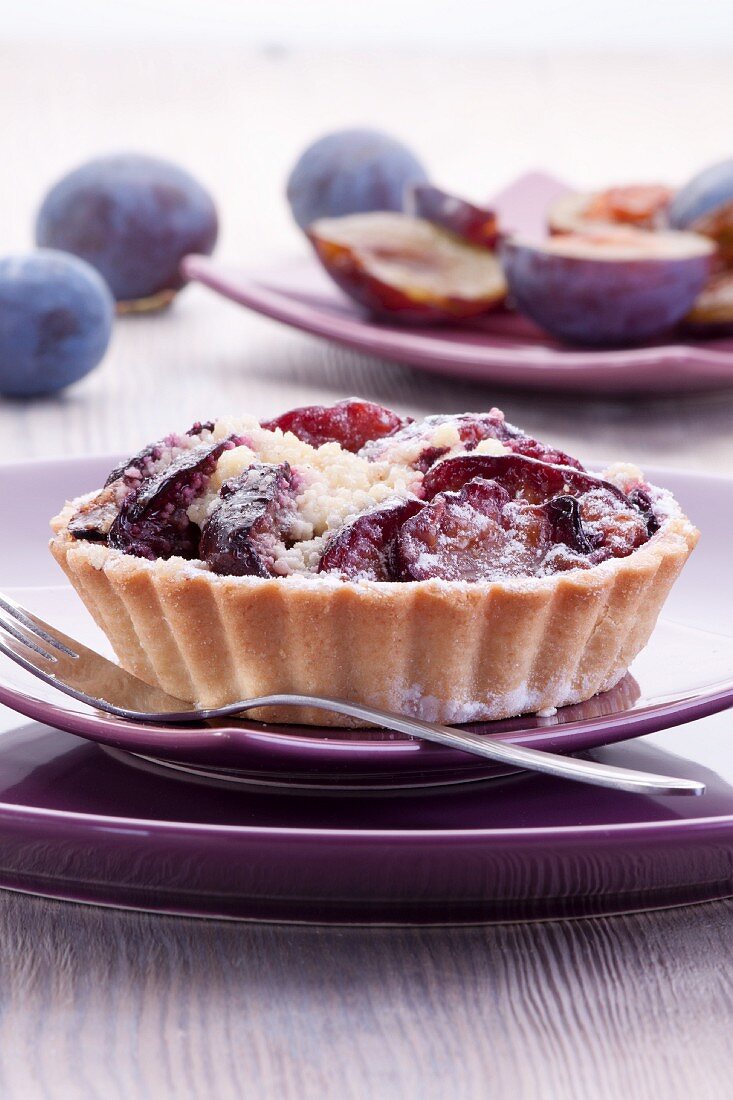 Plum crumble tartlets