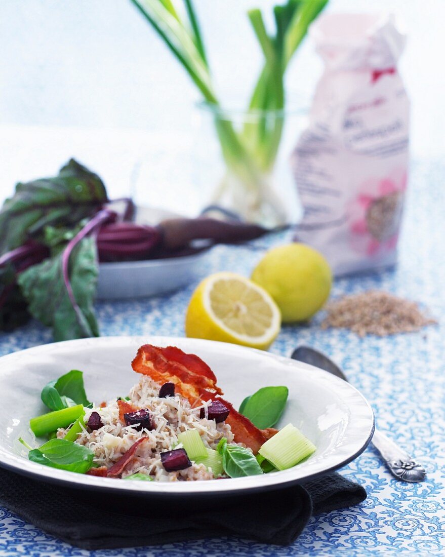 Spelt risotto with beetroot, bacon, leek and lemons