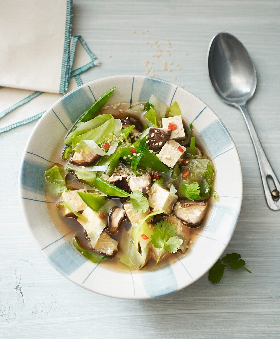 Oriental pointed cabbage stew with tofu and shiitake mushrooms