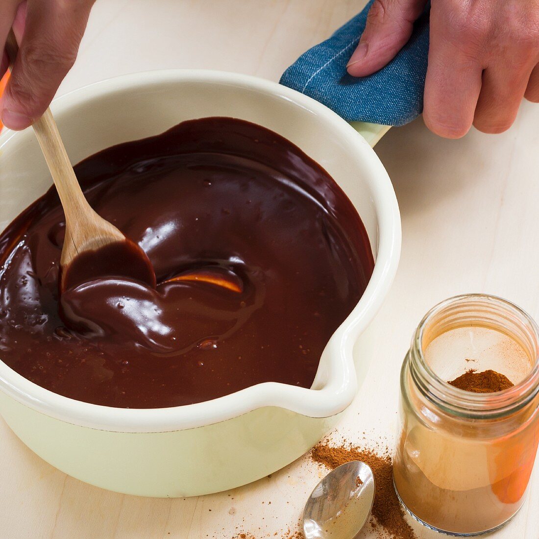 Chocolate sauce being made from vegan chocolate and coconut milk