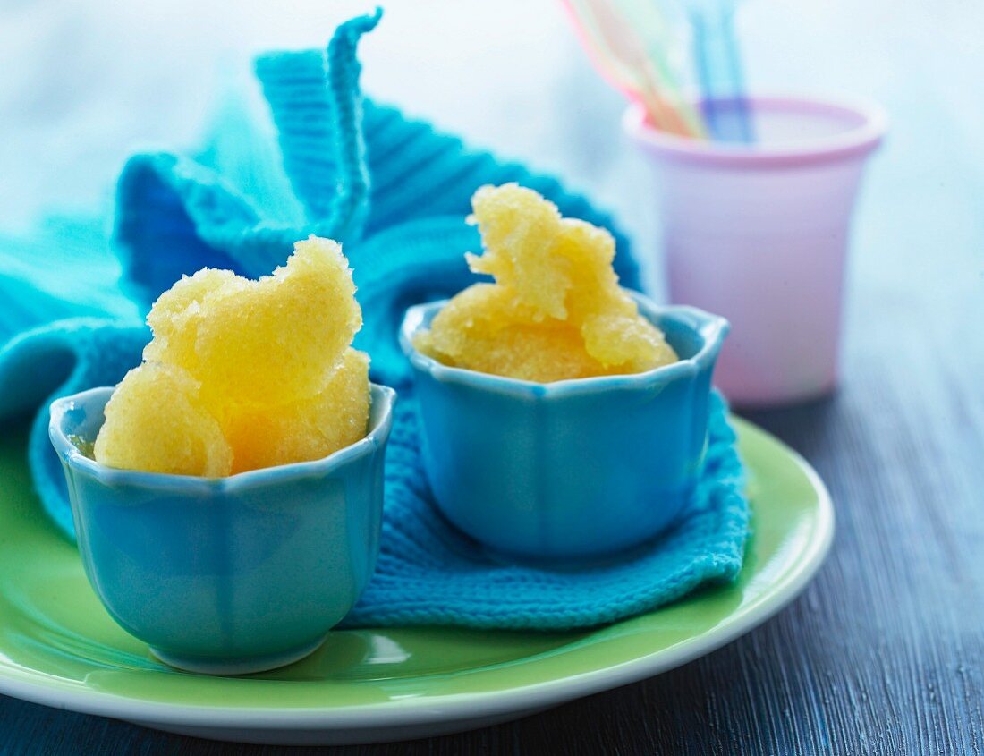 Peach ice cream in blue cups