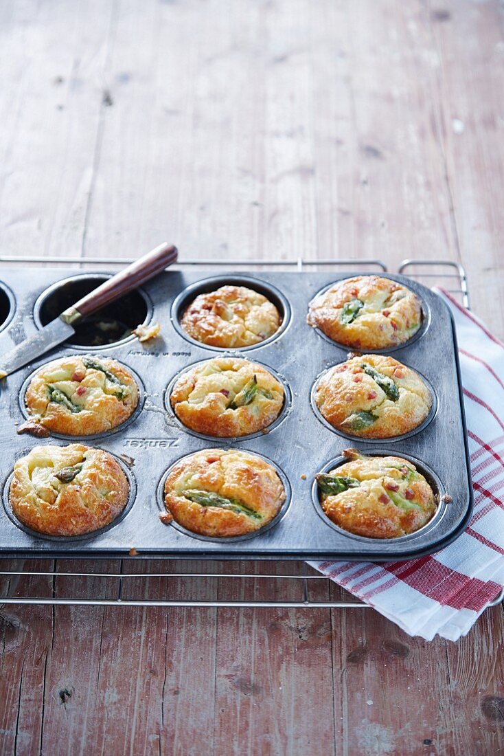 Asparagus muffins in a baking tin