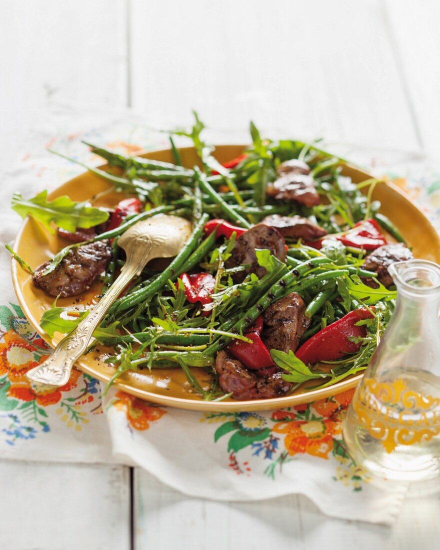 A grilled bean and chicken liver salad