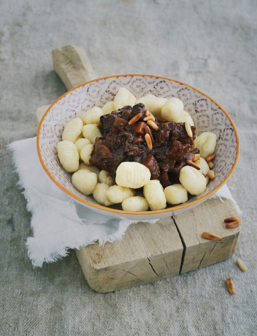 Gnocchi with an oxtail ragout and pine nuts