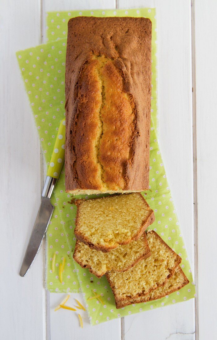 Lemon cake with a piece removed