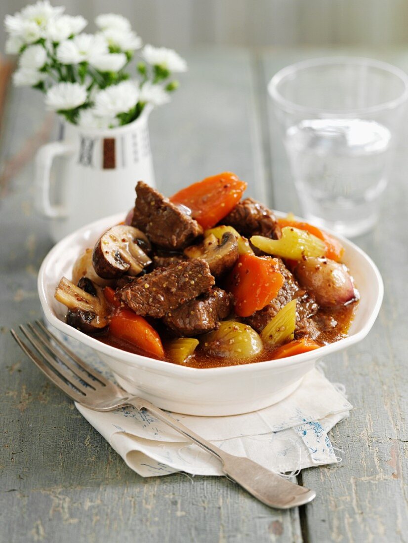 Braised beef with mushrooms, vegetables and ale