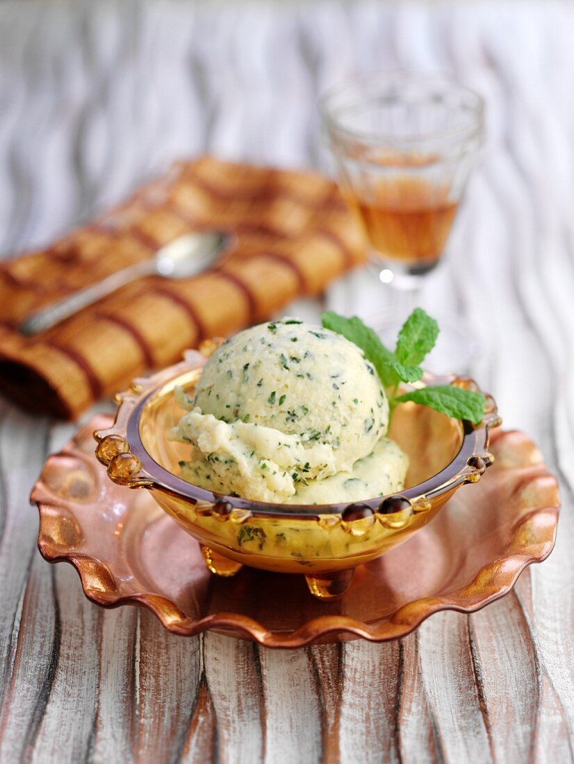 Mango and mint ice cream in a bowl
