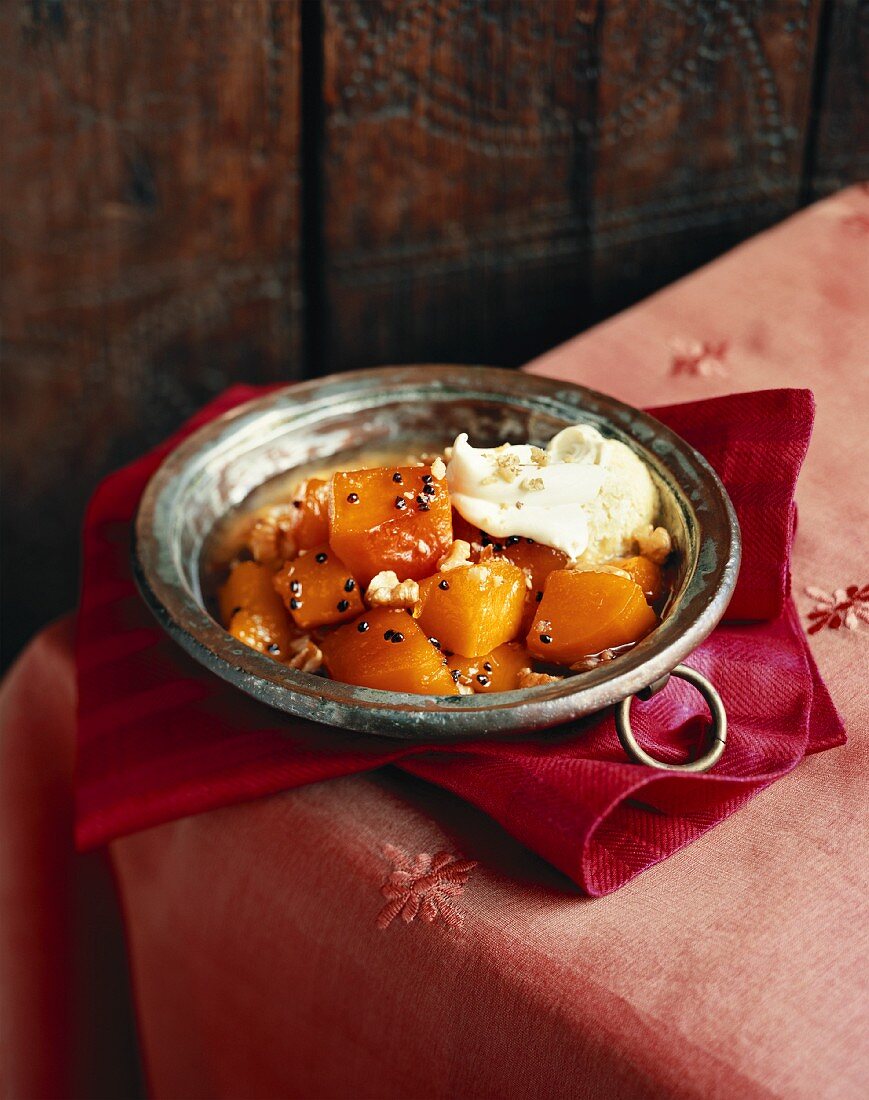 Pumpkin in syrup with cardamom and clotted cream