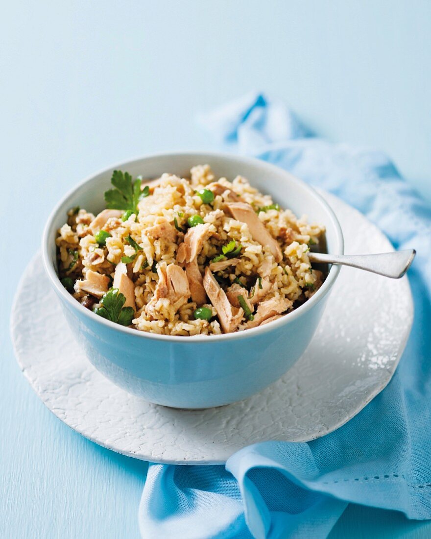 Salmon pilau with bacon, peas and herbs